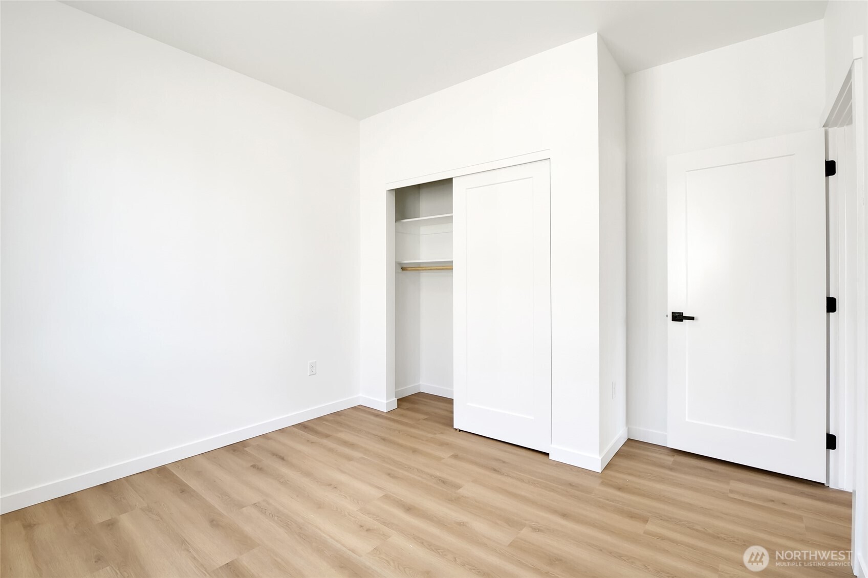 11 Parkside Loop Southeast Ephrata, WA 98823 - Photo 35 of 40 a view of empty room with wooden floor