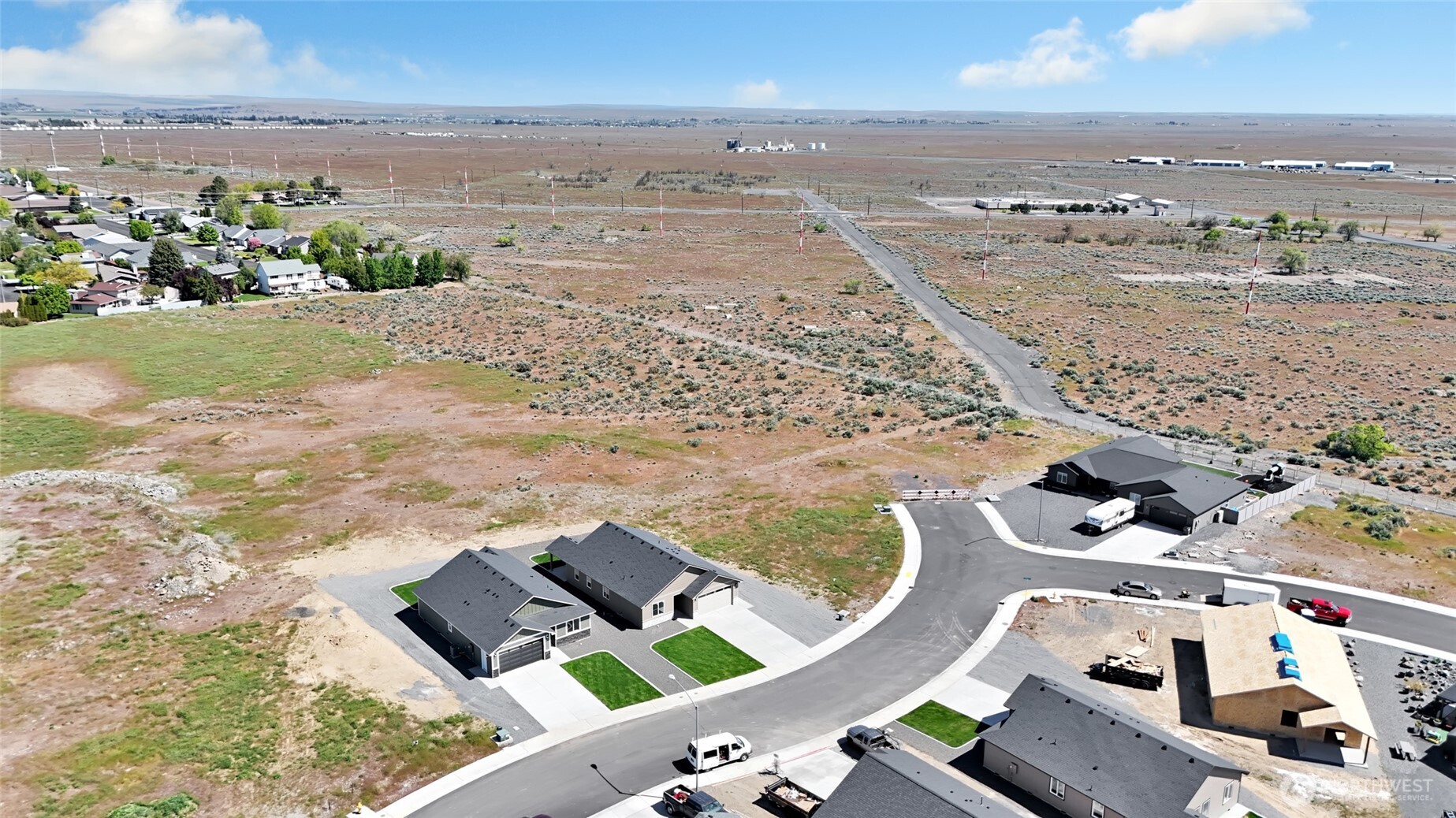 11 Parkside Loop Southeast Ephrata, WA 98823 - Photo 4 of 40 an aerial view of residential houses with outdoor space