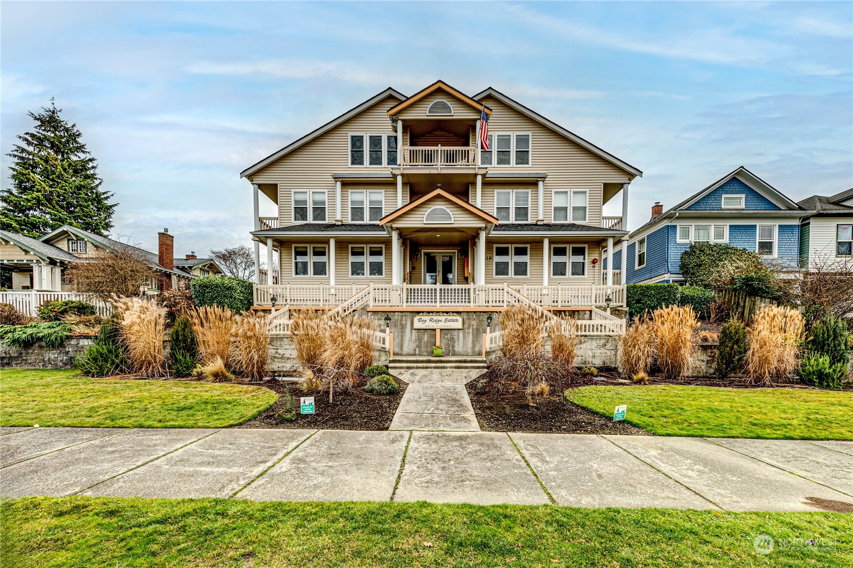 2219 Rucker Avenue, Unit 202 Everett, WA 98201 - Photo 1 of 28 a front view of a house with garden