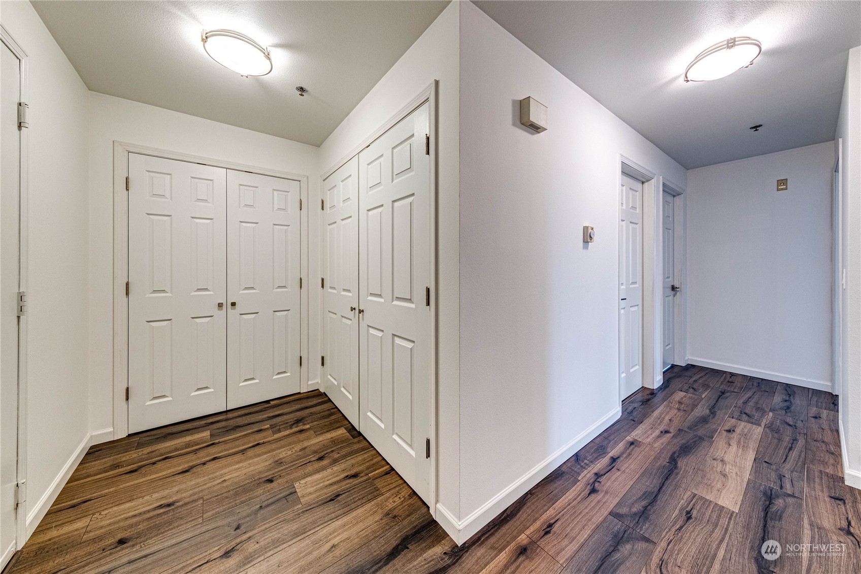 2219 Rucker Avenue, Unit 202 Everett, WA 98201 - Photo 13 of 28 a view of hallway with wooden floor