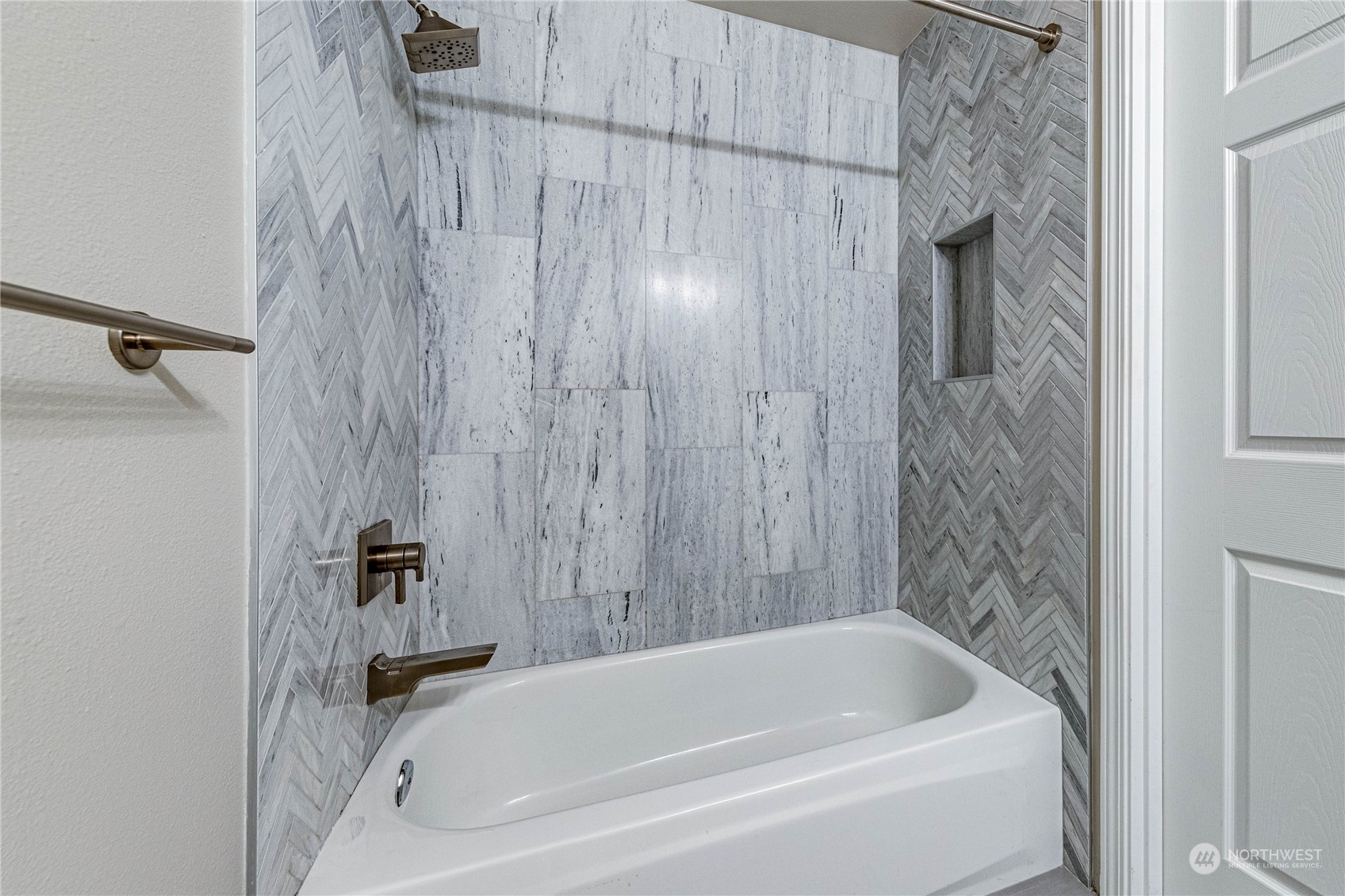 2219 Rucker Avenue, Unit 202 Everett, WA 98201 - Photo 16 of 28 a bathroom with a bathtub