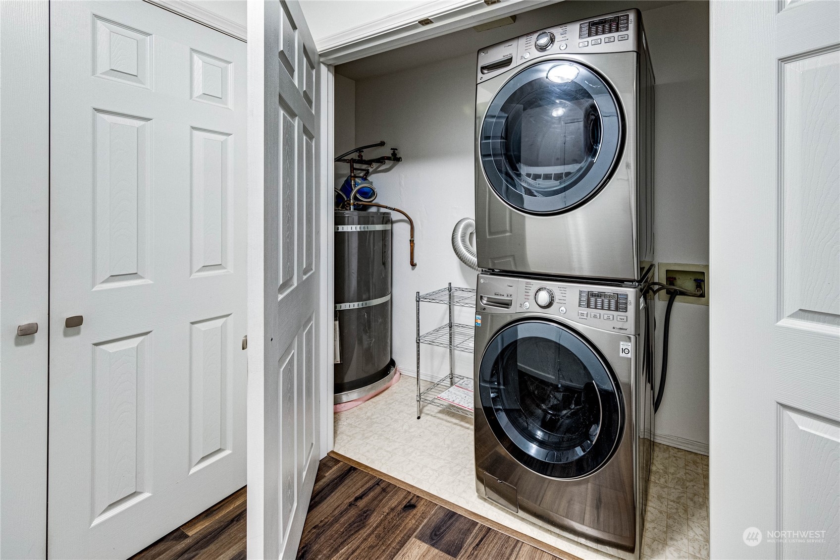 2219 Rucker Avenue, Unit 202 Everett, WA 98201 - Photo 21 of 28 a view of a hallway with washer and dryer