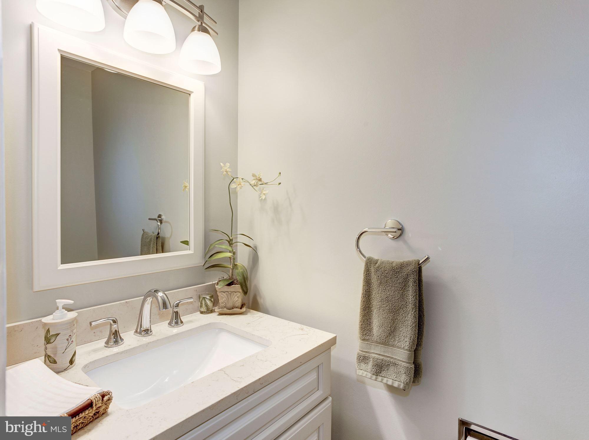8294 Lindside Way Springfield, VA 22153 - Photo 13 of 30 Main level Hallway Bathroom