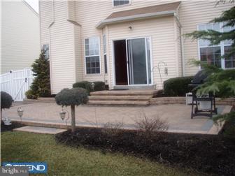 83 Colts Gait Road Marlton, NJ 08053 - Photo 2 of 7 a front view of a house with a yard