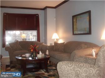 83 Colts Gait Road Marlton, NJ 08053 - Photo 3 of 7 a living room with furniture and a large window