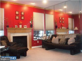 83 Colts Gait Road Marlton, NJ 08053 - Photo 4 of 7 a living room with furniture and a fireplace