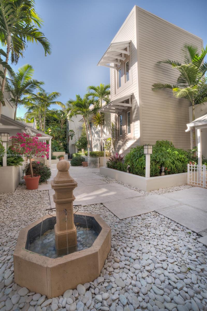 3540 Main Highway, Unit 301 Miami, FL 33133 - Photo 29 of 29 a view of a water fountain in front of a building