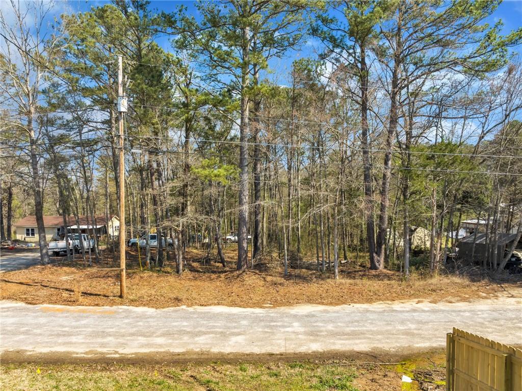 1822 New Street Northeast Conyers, GA 30012 - Photo 2 of 11 a view of a house with snow on the road