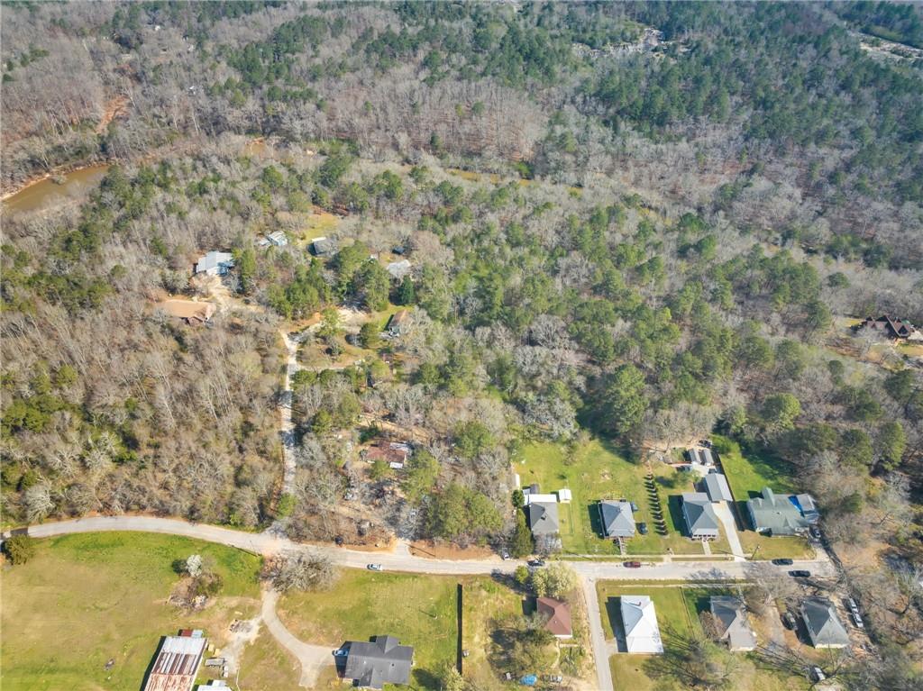 1822 New Street Northeast Conyers, GA 30012 - Photo 10 of 11 a view of houses with swimming pool