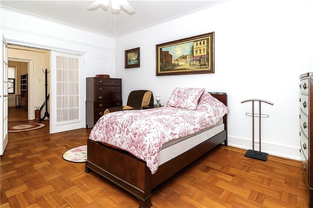 255 79th Street, Unit B4 Brooklyn, NY 11209 - Photo 14 of 23 a bedroom with a bed and dresser