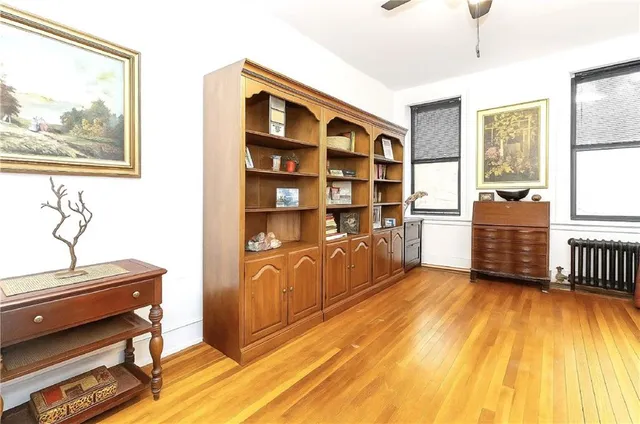 a view of workspace with furniture and window