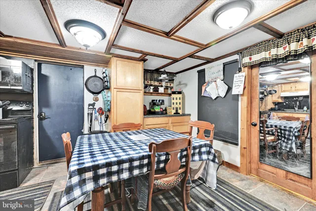 a view of a dining room with furniture