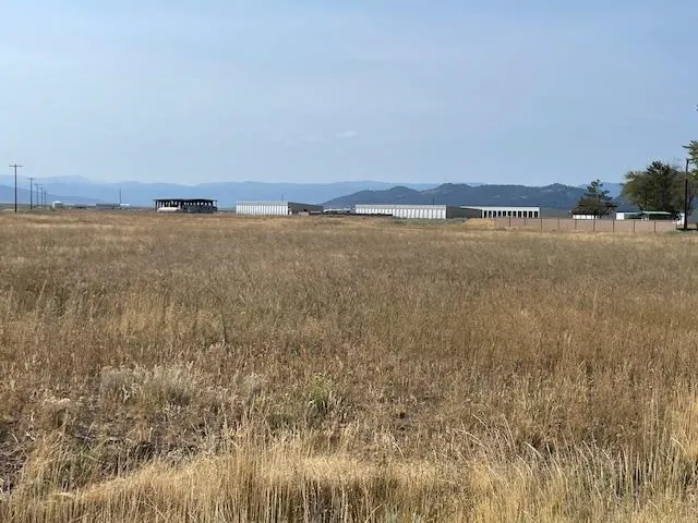 a view of an ocean and mountain