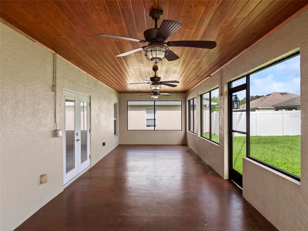512 Bella Rosa Circle Sanford, FL 32771 - Photo 31 of 31 a view of a hallway with windows