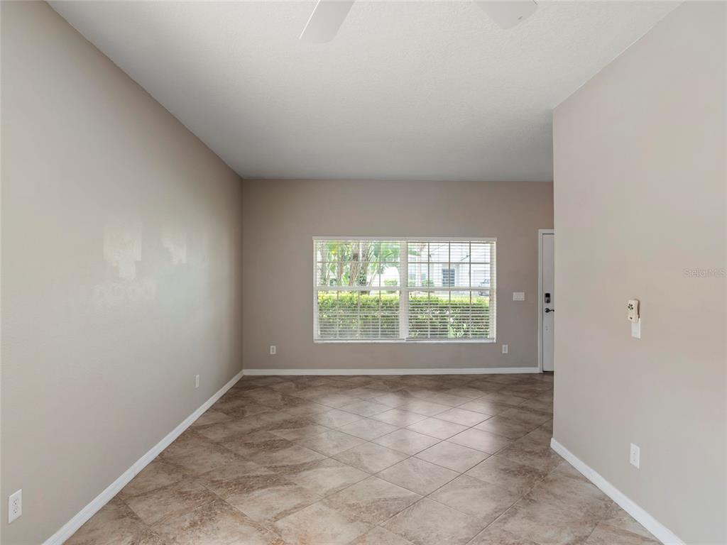 512 Bella Rosa Circle Sanford, FL 32771 - Photo 5 of 31 a view of an empty room and a window