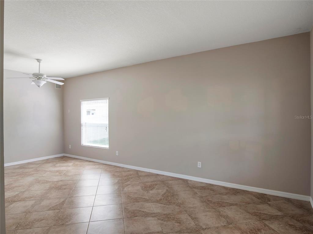 512 Bella Rosa Circle Sanford, FL 32771 - Photo 6 of 31 an empty room with windows and closet