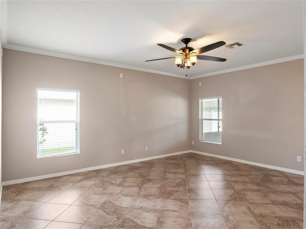 512 Bella Rosa Circle Sanford, FL 32771 - Photo 10 of 31 a view of an empty room with a window