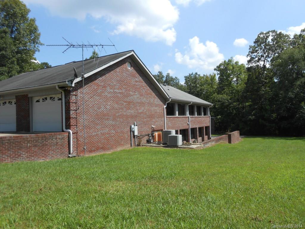1883 Potter Road Lancaster, SC 29720 - Photo 16 of 17 a view of a house with a yard and sitting area