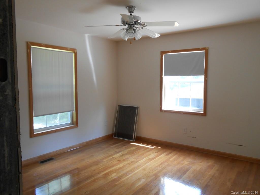 1883 Potter Road Lancaster, SC 29720 - Photo 6 of 17 an empty room with a window and a fan