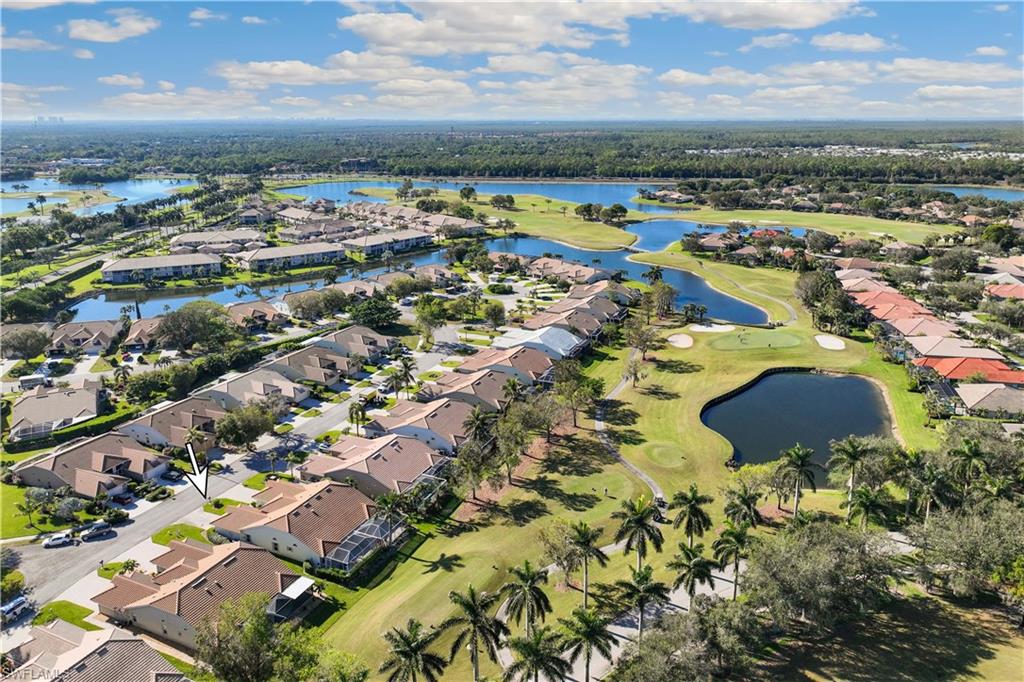 8526 Mustang Drive Naples, FL 34113 - Photo 21 of 24 Drone / aerial view featuring a water view