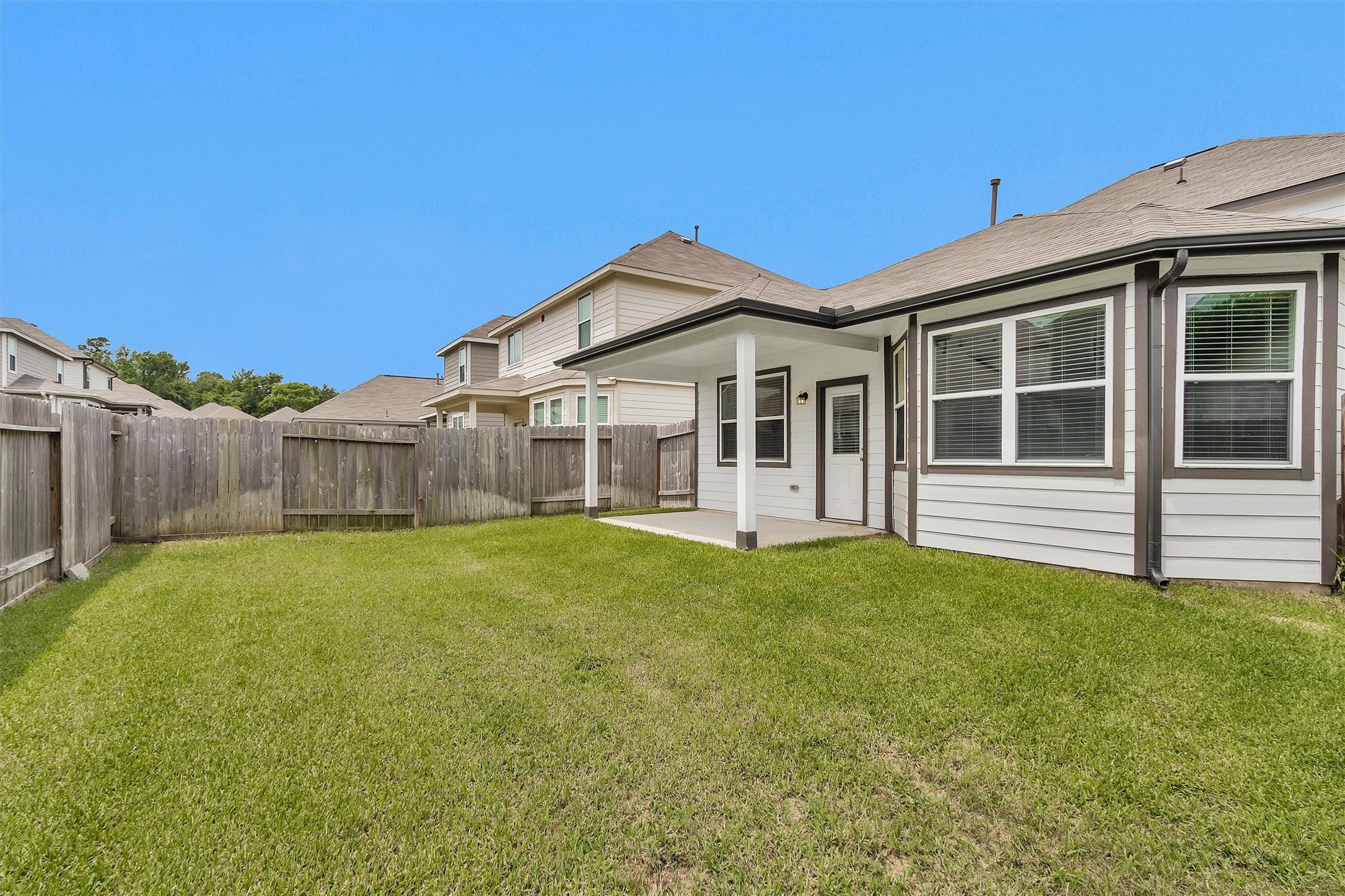 13534 Luke Prairie Willis, TX 77378 - Photo 29 of 29 another view of the backyard.