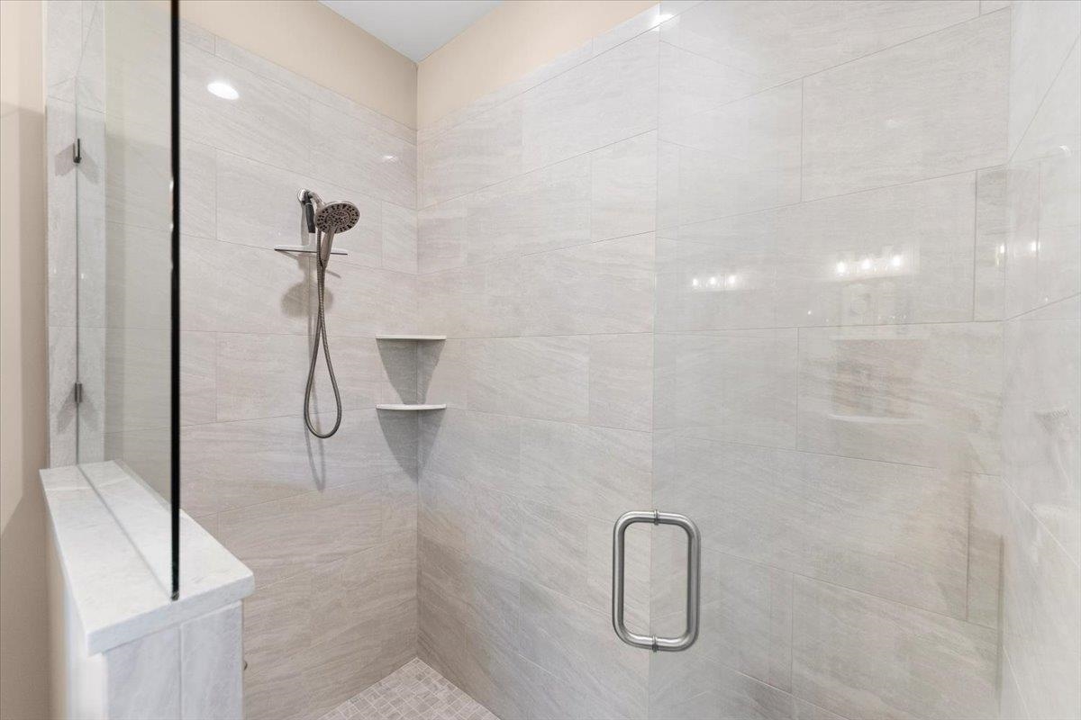 633 West Pope Road St. Augustine, FL 32080 - Photo 25 of 42 a bathroom with a shower