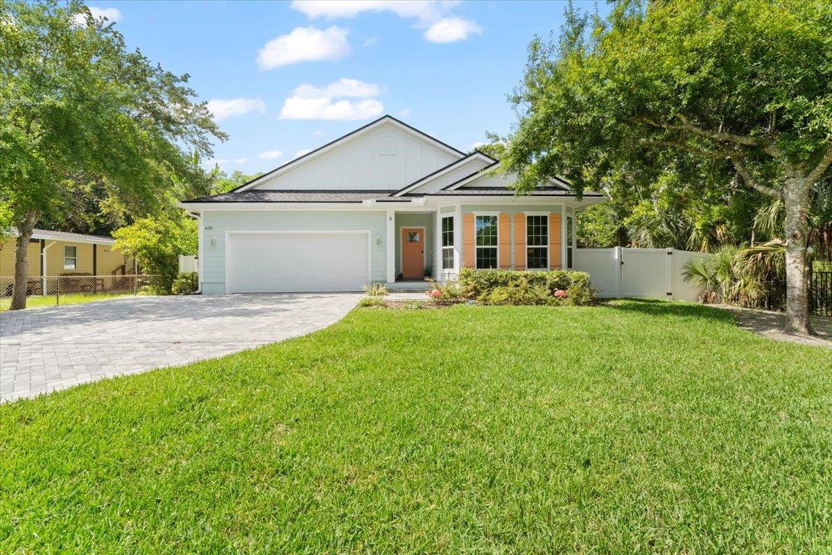 633 West Pope Road St. Augustine, FL 32080 - Photo 32 of 42 a front view of house with yard and green space