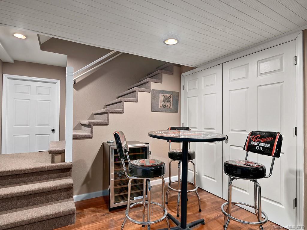 263 Stoney Brook Drive Clyde, NC 28721 - Photo 18 of 25 a view of livingroom with furniture and staircase