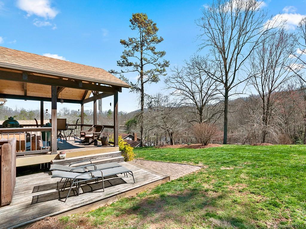 263 Stoney Brook Drive Clyde, NC 28721 - Photo 25 of 25 a view of a backyard with a sitting area