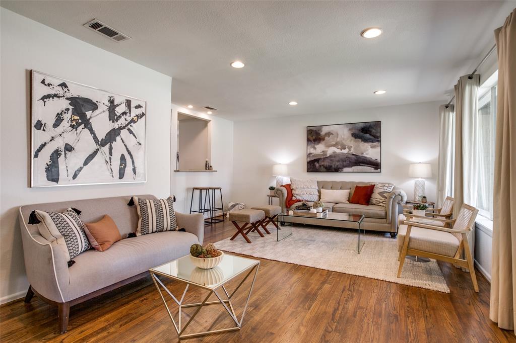 a living room with furniture and a couch