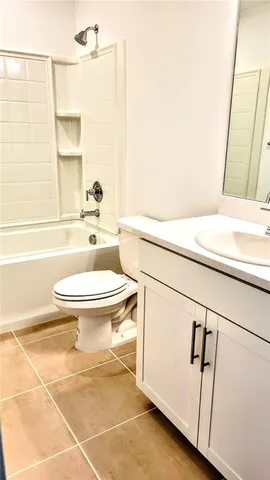 a view of an empty room with basketball court