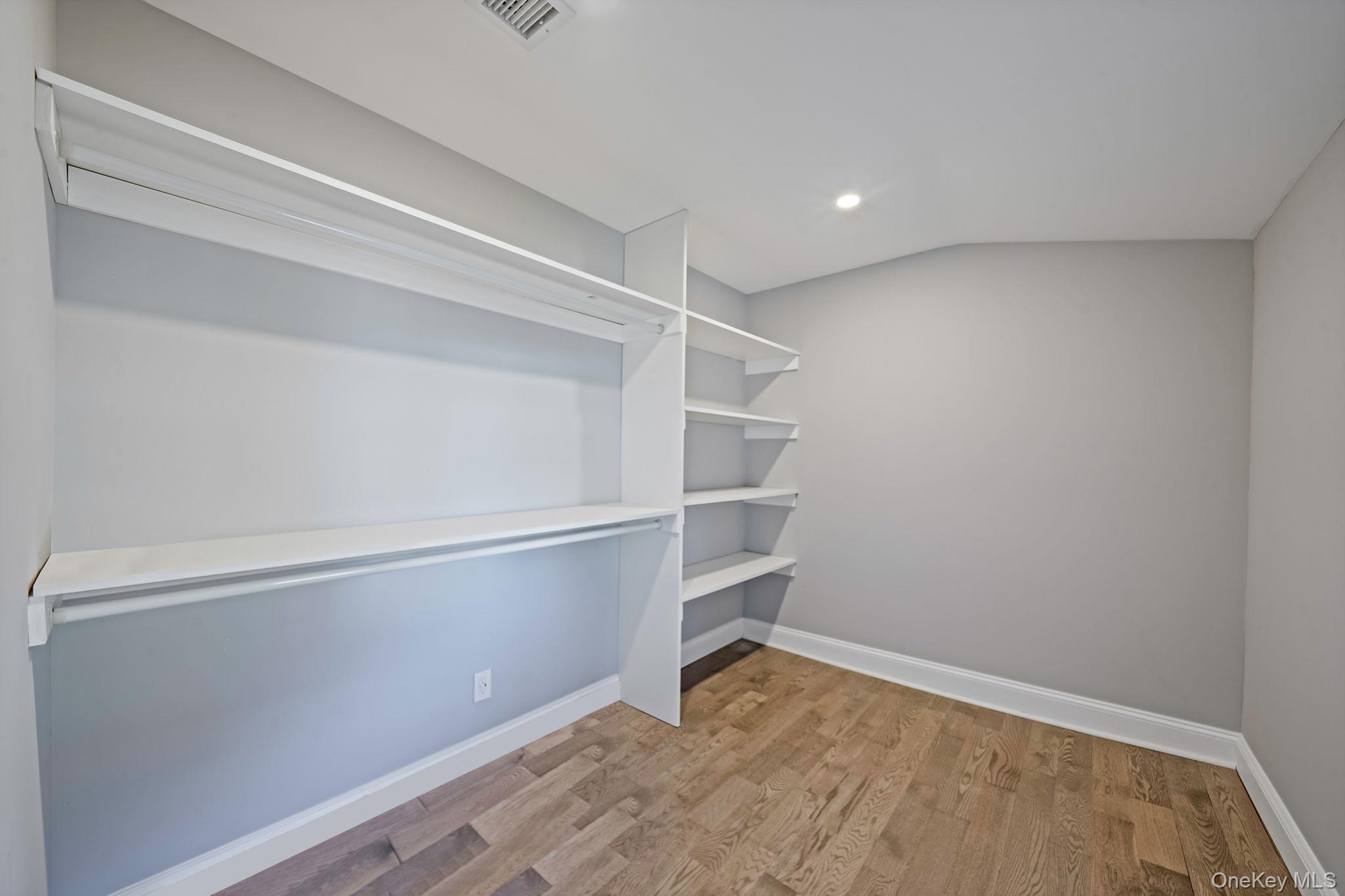 141 Wilmot Road Scarsdale, NY 10583 - Photo 22 of 49 Spacious closet featuring light wood-style floors