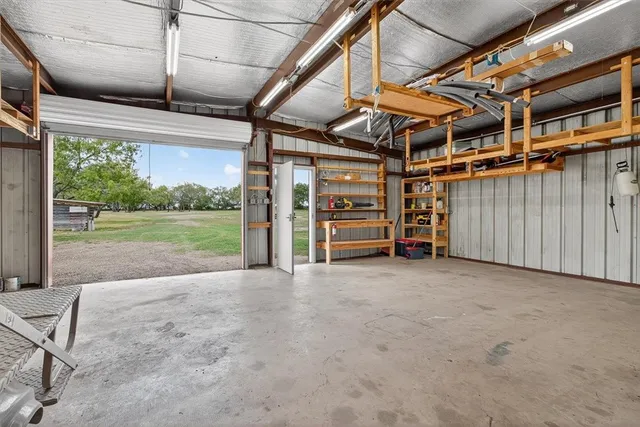 a view of a room with wooden walls