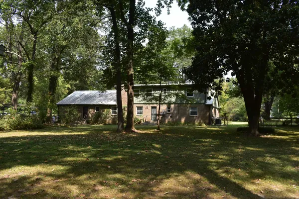 a view of a table and chairs in the patio