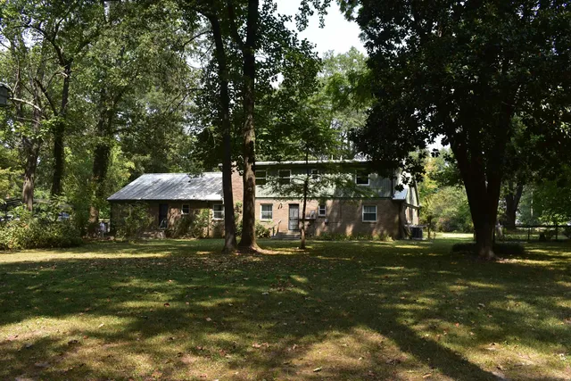 a view of a table and chairs in the patio