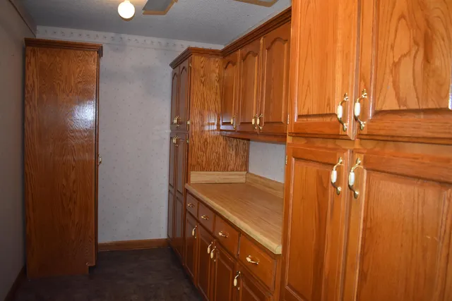 a bathroom with a shower and a sink