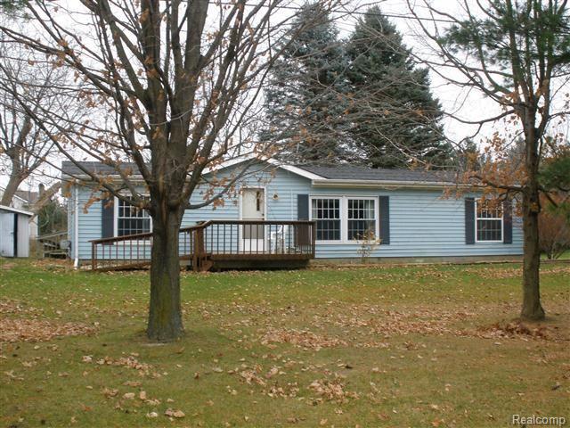 4988 North Nicholson Road Fowlerville, MI 48836 - Photo 1 of 9 Front