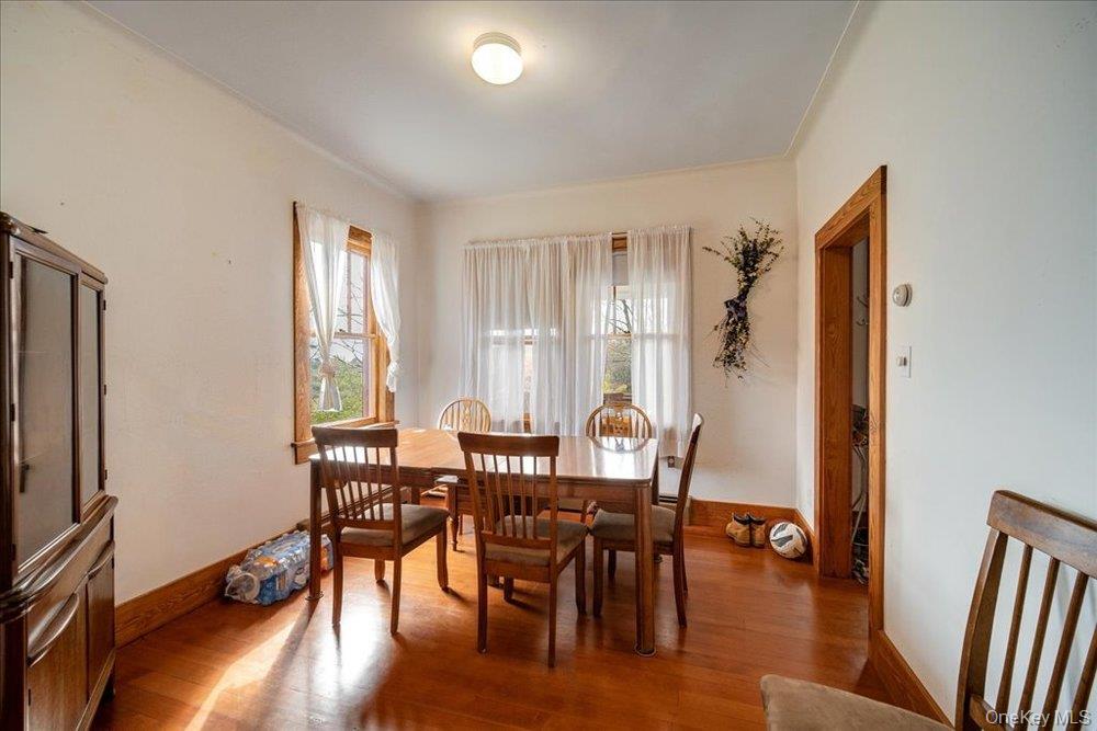 30 Walnut Mountain Road Liberty, NY 12754 - Photo 11 of 48 a view of a a dining room with furniture window and wooden floor