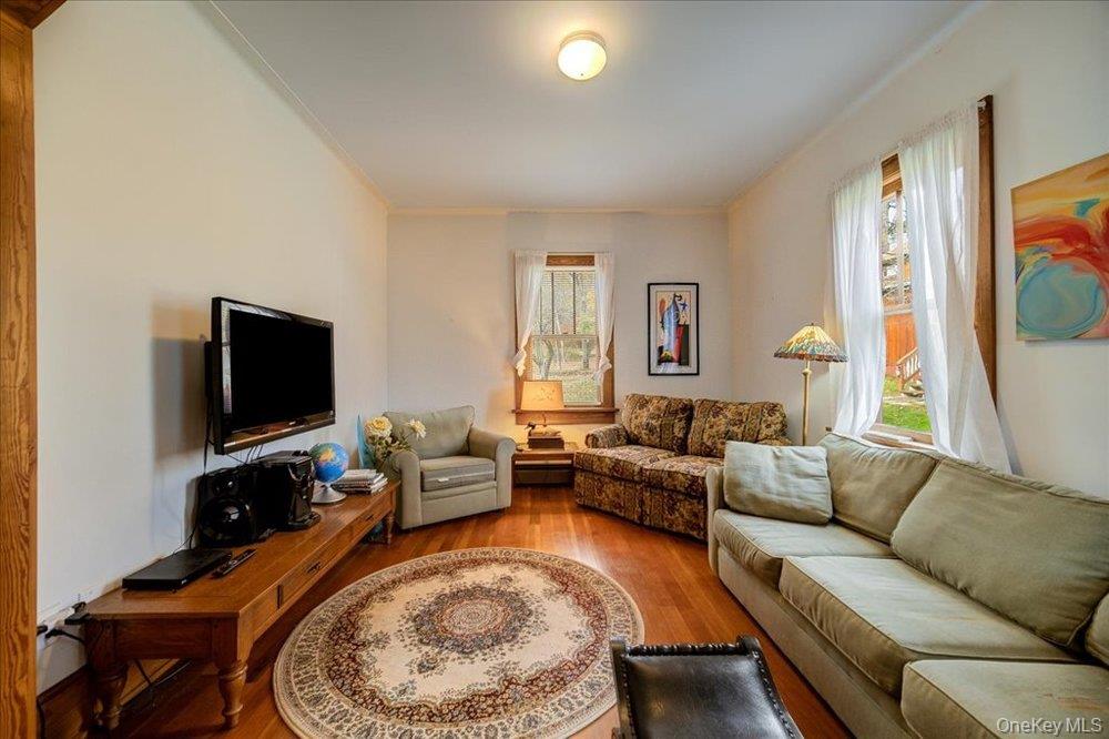 30 Walnut Mountain Road Liberty, NY 12754 - Photo 17 of 48 a living room with furniture and a flat screen tv