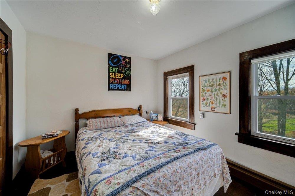30 Walnut Mountain Road Liberty, NY 12754 - Photo 24 of 48 a bedroom with a bed and a window