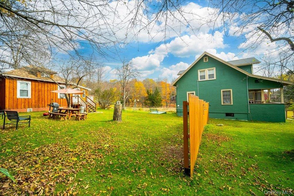30 Walnut Mountain Road Liberty, NY 12754 - Photo 26 of 48 a view of backyard with a garden and trees