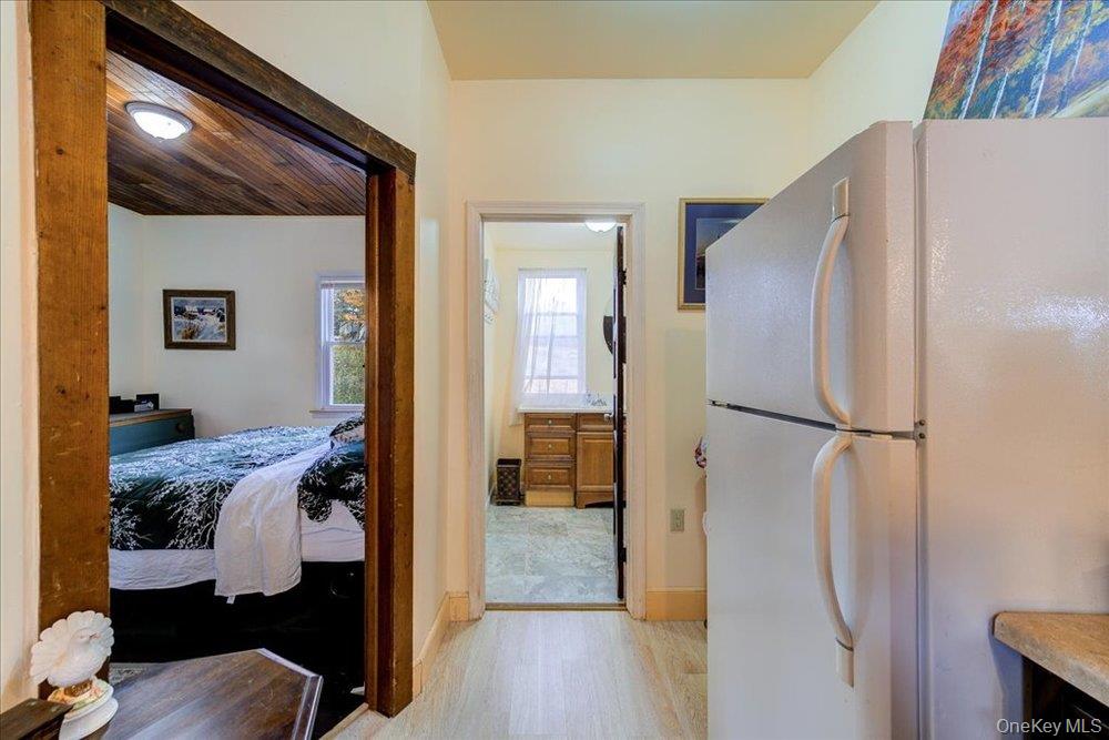 30 Walnut Mountain Road Liberty, NY 12754 - Photo 37 of 48 a bedroom with a bed and a view of bathroom