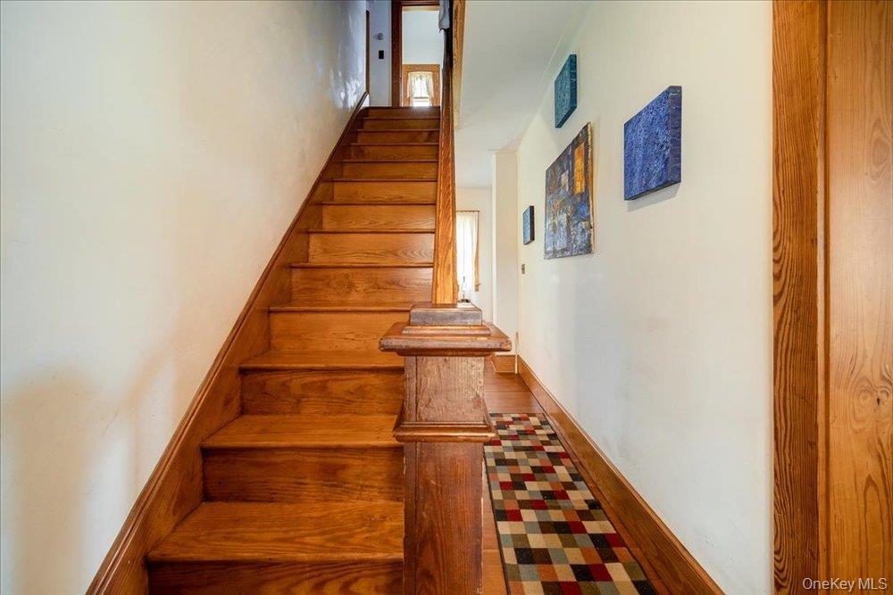30 Walnut Mountain Road Liberty, NY 12754 - Photo 9 of 48 a view of staircase with wooden floor and white walls