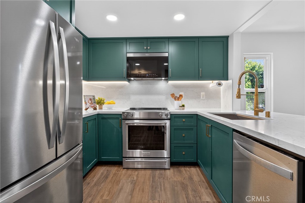 23102 Kimmore Terrace Valencia, CA 91355 - Photo 8 of 45 Kitchen