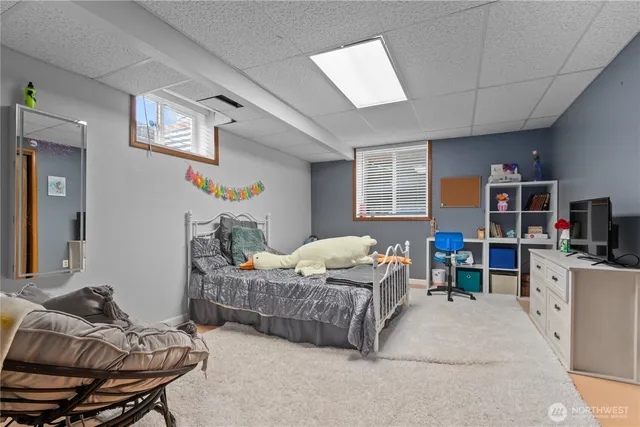 a bathroom with a sink a vanity and a mirror