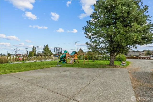 a view of a garden with an outdoor space