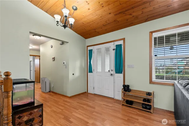 a view of livingroom with furniture and windows