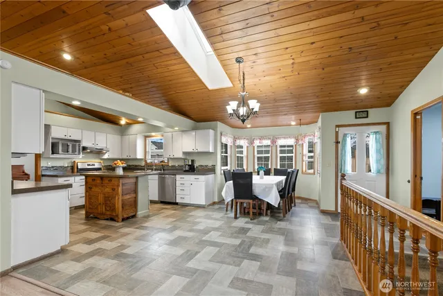 a large open kitchen with a large window