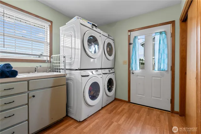 a bedroom with bed and window
