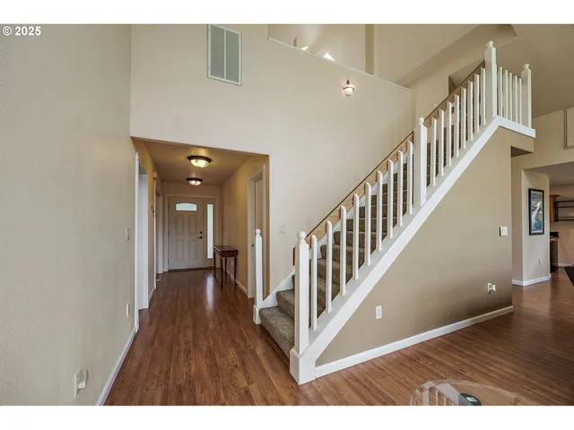 a view interior of a house with wooden floor and windows
